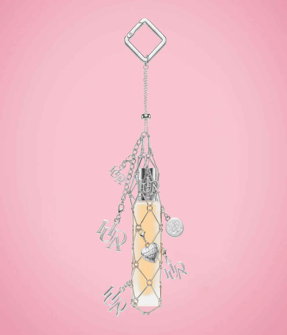 HUDA BEAUTY | TRAVEL SPRAY FRAGRANCE HOLDER WITH CHARMS